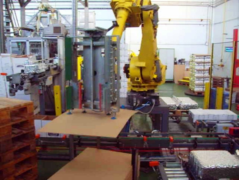 Robots Industriales - Manipulando palet y carton entre capas