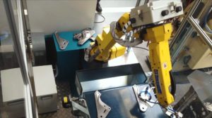 alimentacion-automatica-de-piezas-a-soldadora-de-componentes-mediante-robot-equipado-con-vision